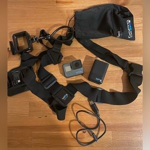 GoPro Hero 5 with Chesty, Camera Case, Two batteries, charging block, and cord
